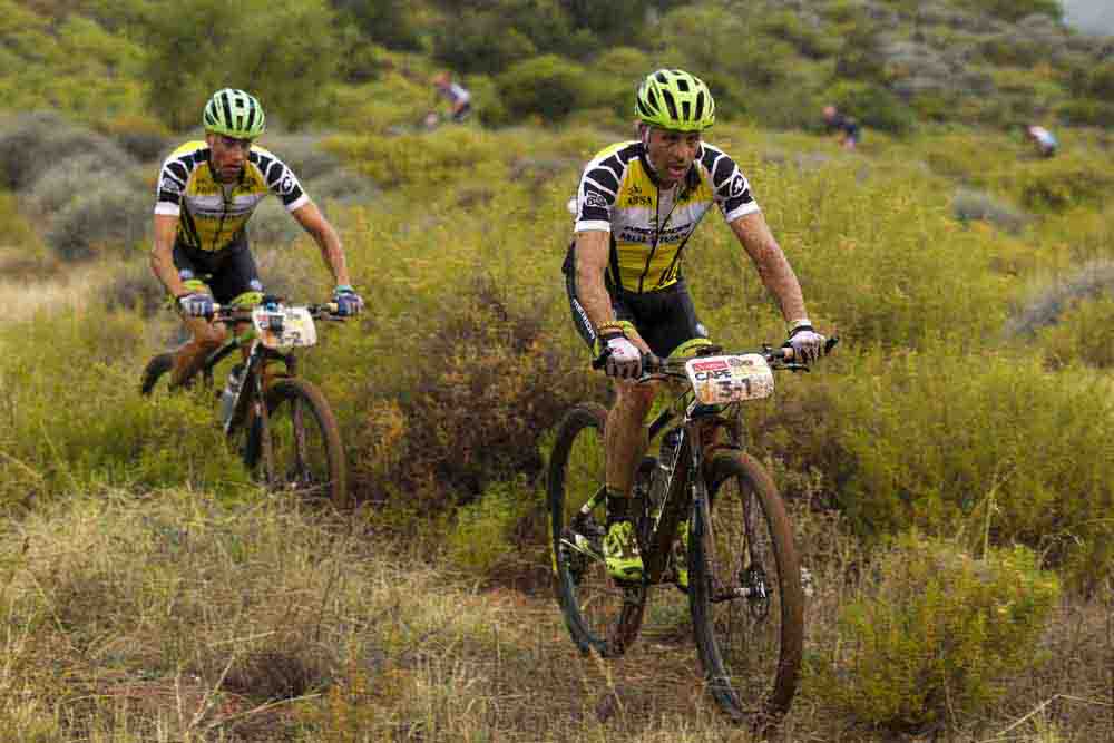 ROBERTSON 24 MARCH 2014 - Overall leaders Jose Hermida & Rudi Van Houts of Merida Biking Team suffered during stage 1 of the 2014 Absa Cape Epic Mountain Bike stage race held from Arabella Wines in Robertson, South Africa on the 24 March 2014. Photo: Gary Perkin/Cape Epic/SPORTZPICS