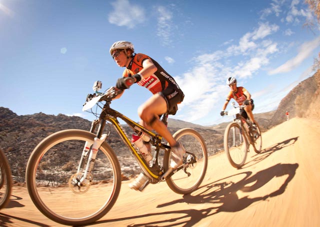  Jane Nuessli (front) and Sally Bigham(rear) during stage 1 of the 2013 Absa Cape Epic, this year Bigham will be riding with Esther Seὔss. Photo: Sam Clark/Cape Epic/SPORTZPICS