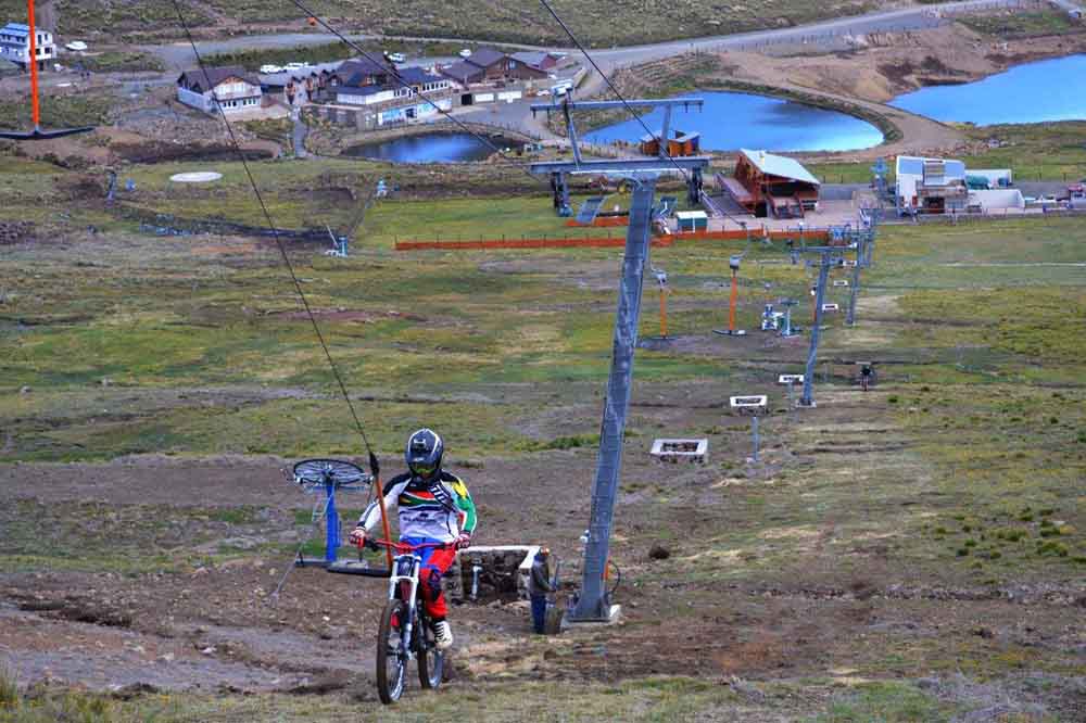 Tiaan Odendaal uses the T-Bar uplift for downhill riders at the Afriski Ski and Mountain Resort in Lesotho ahead of round two of the 2014 Southern African Mountain Bike Cup Series, which takes place on 19 and 20 April. Photo: supplied