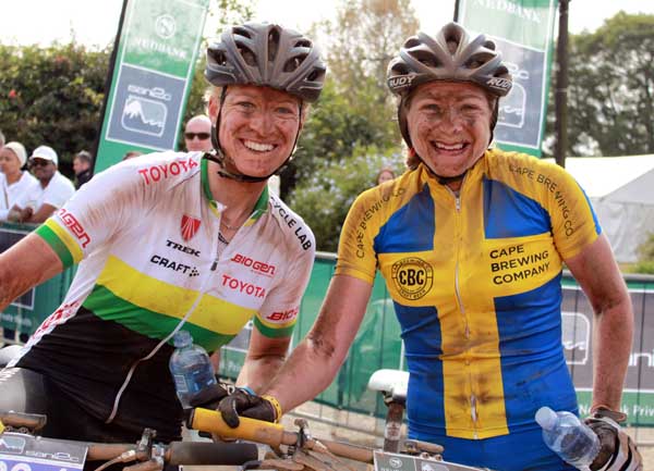 South African national marathon champion Robyn de Groot (left) and her Swedish counterpart Jennie Stenerhag consolidated their overall lead in the women’s race when they won day two of the three-day Nedbank sani2c mountain bike stage race on Friday.  Photo: Full Stop Communications