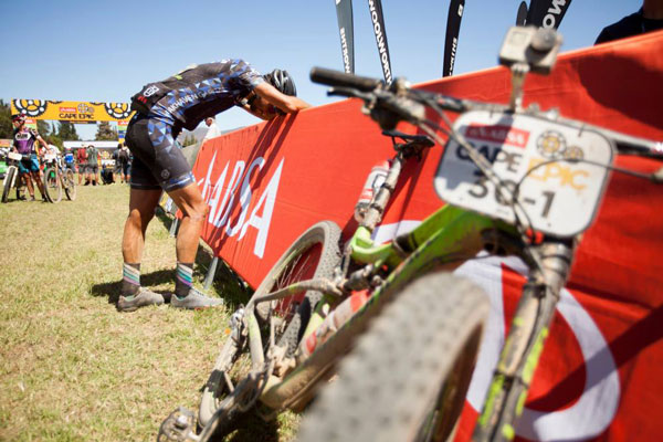 Oliver Munnik, an experienced, conditioned Cape Epic competitor, regains his composure after a Stage 1 of the 2016 Absa Cape Epic. Photo: Gary Perkin/Cape Epic/SPORTZPICS