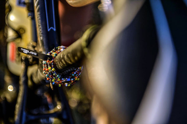 The famous beaded bangles at riders receive at the start of the second day of the KAP sani2c have become sought after and are the product of a programme at the Hlanganani Ngothando Organisation, which empowers people around the Bulwer area of KwaZulu-Natal through trade. Photo: Kelvin Trautman/Gameplan Media