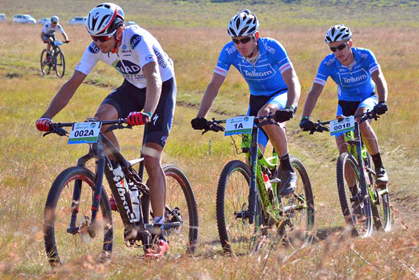 NAD Pro’s Nico Bell leads Telkom’s Johann Rabie and HB Kruger during the second stage of the 2016 Old Mutual joBerg2c between Frankfort and Reitz today. Photo supplied.