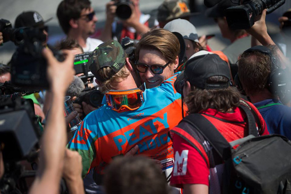It was also the final World Cup race at Fort William for Minnaar’s British Santa Cruz Syndicate teammate, Steve Peat, racing his final year before retiring. Pictured here, 'Peaty' congratulates Greg on his flawless win. Photo: Michael Cerveny