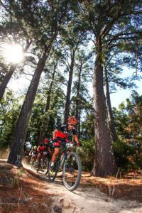 Team Spur's James Reid leads a group of riders through the Saasveld singletracks on Stage 3 of the Cape Pioneer Trek, on 19th of October 2016. Photo: Oakpics.com