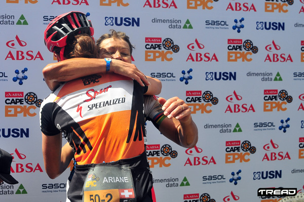 Ariane Kleinhans (Team Spur Specialized) and Sabine Spitz (Team CST Sport for Good) congratulate each other at the finish of a tough stage 5 of the 2016 ABSA Cape Epic. Photo: Dino Lloyd